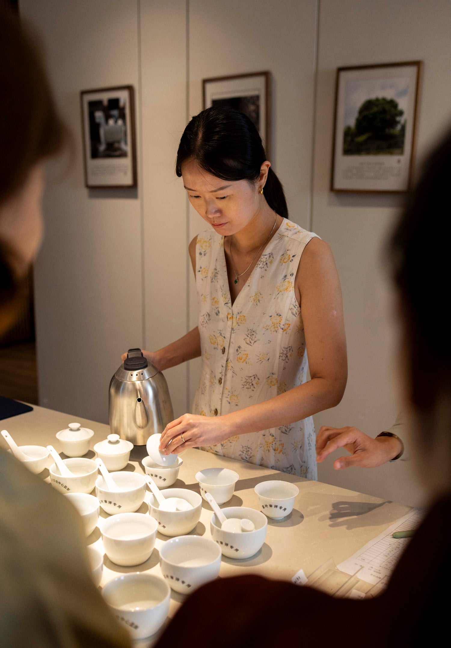 Tea teacher Pink Luk is serving Wuyi Yancha