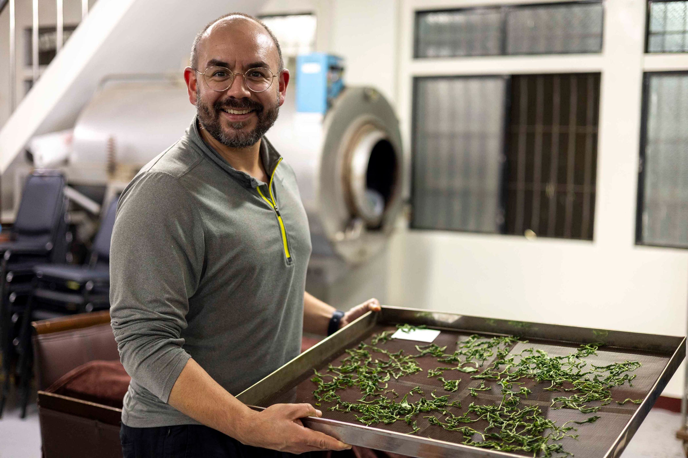 Marco Steap'd is drying tea leaves in DIY tea workshop in Alishan