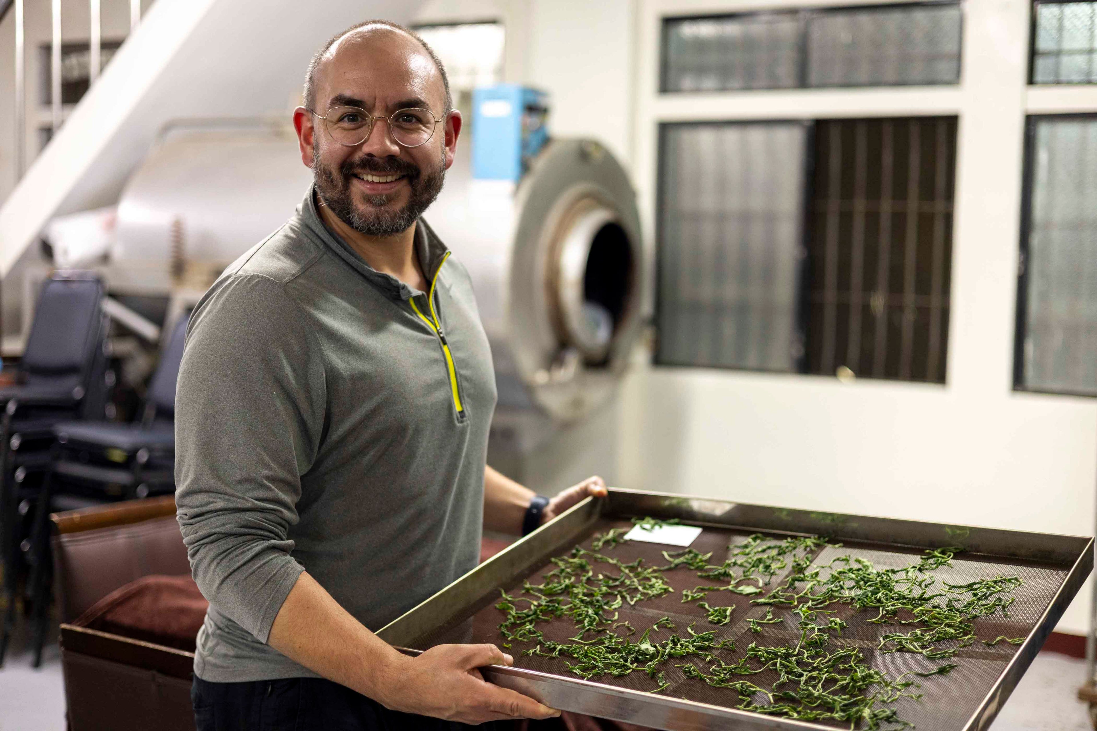 Marco Steap'd is drying tea leaves in DIY tea workshop in Alishan